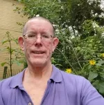 Robert Coxe in the McMullen garden.